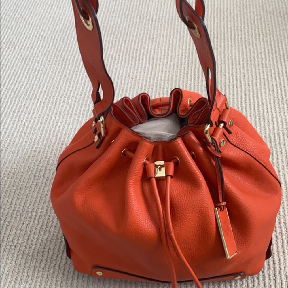 Vince Camuto drawstring bag. Lots of room.